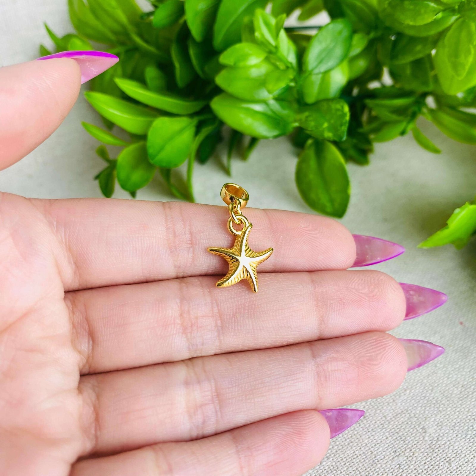 Berloque Estrela do Mar Banhado a Ouro 18k